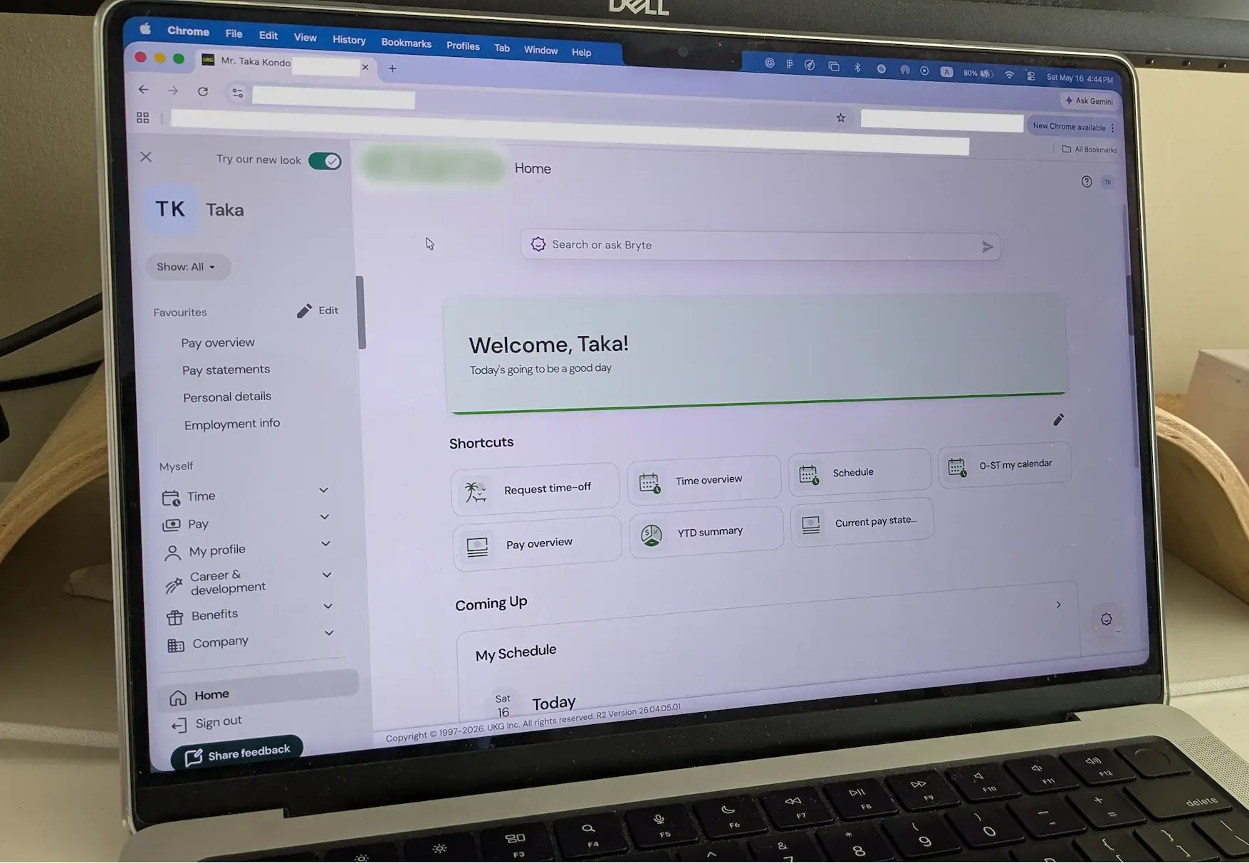 UKG Pro dashboard displayed on a laptop screen